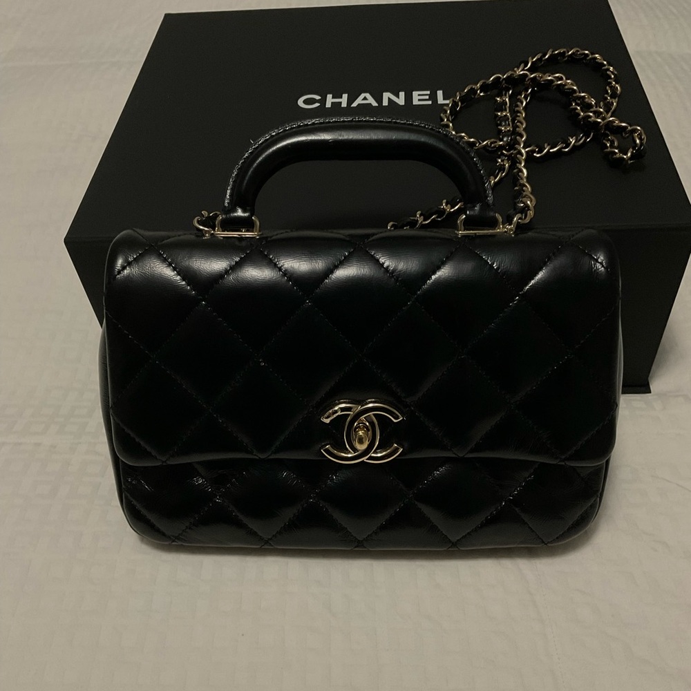 CHANEL Shiny Lambskin Quilted Coco
Trip Flap Bag Black Item #: 1807911 - Picture 13 of 13